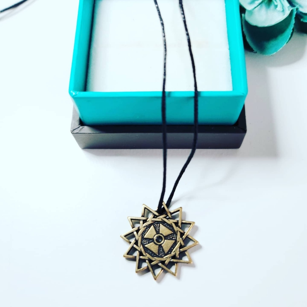 Ertzgamma Lucky Star pendant with a cord